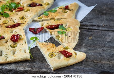 Traditional Italian Focaccia With Tomatoes, Black Olives And Rosemary - Homemade Flat Bread Focaccia