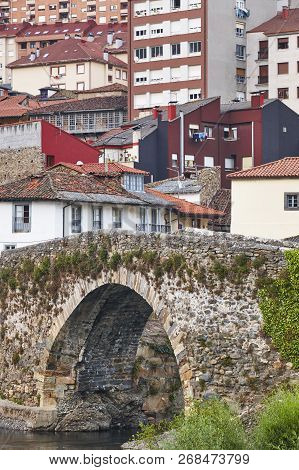 Traditional Village In Asturias With Stone Bridge, Cangas Narcea. Spain