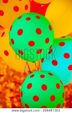 Helium Balloons. Colorful helium balloons. Floating away in the blue sky. Birthday Balloons. Party Time.