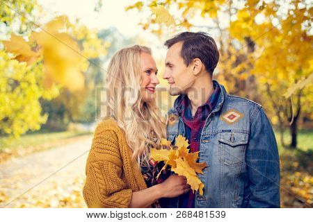 Photo Of Couple In Love At Autumn Forest In Afternoon