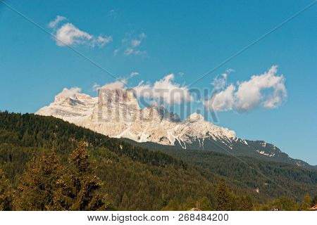Panoramic View Of The Dolomite Mountains. Mountain Village Cortina Di Ampezzo.