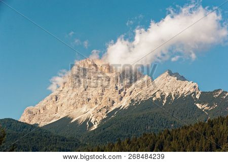 Panoramic View Of The Dolomite Mountains. Mountain Village Cortina Di Ampezzo.