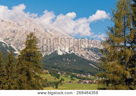 Panoramic View Of The Dolomite Mountains. Mountain Village Cortina Di Ampezzo.