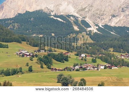 Panoramic View Of The Dolomite Mountains. Mountain Village Cortina Di Ampezzo.