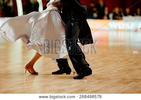 Ballroom Dance Partner Dancers In White Dress And Black Suit Tail