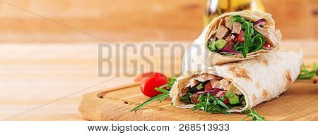 Tortillas Wraps With Chicken And Vegetables On  Wooden Background. Chicken Burrito. Banner. Healthy 