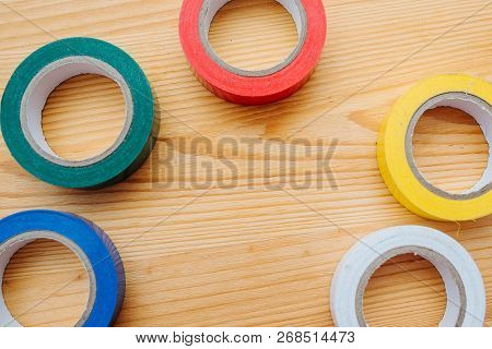Color Rolls Of Gaffer Tape, Duct Tape, On A Wood Background