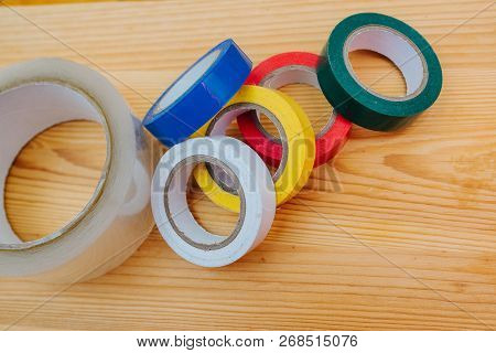 Color Rolls Of Gaffer Tape, Duct Tape, On A Wood Background