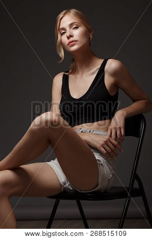 Fashion Model With Long Hair, Perfect Skin Is Posing In Studio For Glamour Test Photo Shoot Showing 