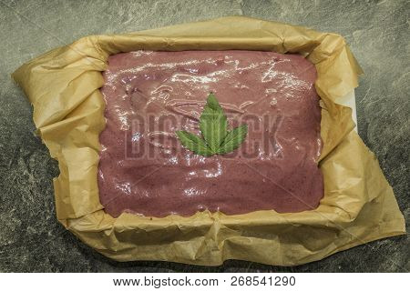 Cooking Of Marijuana Poppy Seed Cake With Chocolate And Pink Fruit Glaze