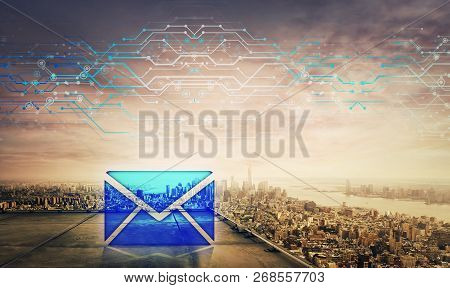 Blue Message Icon Hologram On The Rooftop Of A Skyscraper Over The Big City Sunset Horizon, Double E