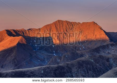 The Moldoveanu Peak In Sunrise. Fagaras Mountains, Romania