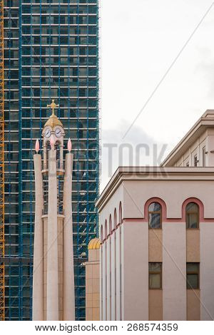 Tirana, Albania - 30 June 2014:mosque Ethem Beja And Clock Tower On A New-rise Skyscraper Background