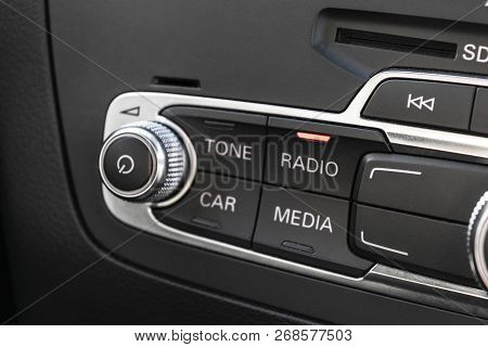 Media And Navigation Control Buttons Of A Modern Car. Car Interior Details. Black Leather Interior O
