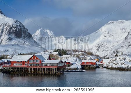 Traditional fishing village A on Lofoten Islands, Norway with red rorbu houses. With snow in winter