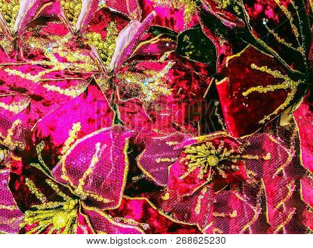 Closeup Of Beautiful Light Christmas Decoration With Red Flowers. Flowers In The Shop. Background Fo