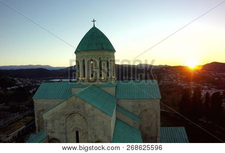 Bagrati cathedral standing in Kutaisi , sunset. sky, Georgia. medieval monastic complex.