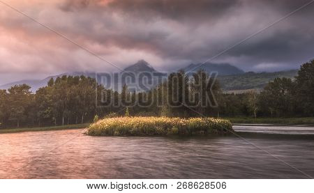 Strba Lake Under The  Peaks Of High Tatras Mountains At Sunset