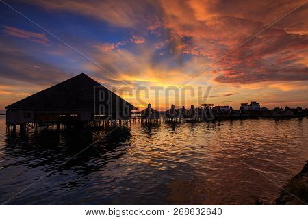 Beautiful Twilight Sunrise With Silhouette Floating Resort In Semporna, Sabah, Borneo (image Contain
