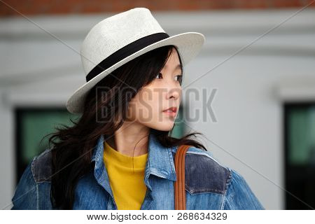 Young Asian Woman Portrait Smiling With Happiness At City Outdoors Background, Casual Lifesyle, Trav