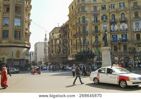 Cairo, Egypt - February 7, 2010: Pedestrians & Buildings In Talaat Harb Square