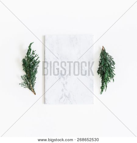 Christmas Composition. Fir Tree Branches, Marble Notebook On White Background. Christmas, Winter, Ne