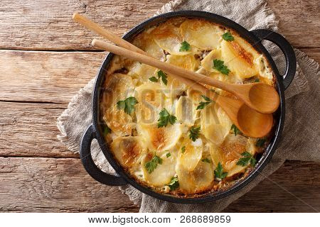 Janssonin Kiusaus Four Ingredient Finnish Potato Bake Closeup On The Table. Horizontal Top View
