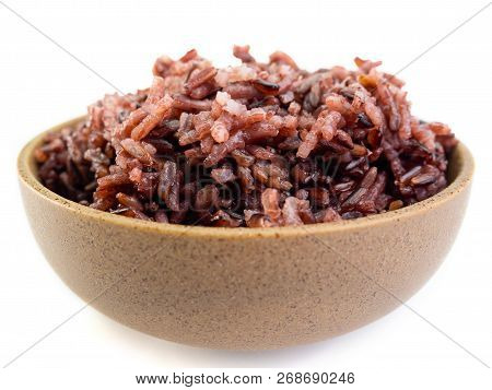 Rown Rice, Riceberry Organic Food ,healthy Food Eating Concept , Isolated On White Background.