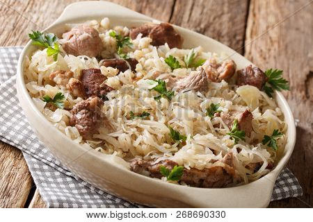 Traditional Estonian Festive Dish Of Pork, Barley And Sauerkraut Closeup On The Table. Horizontal