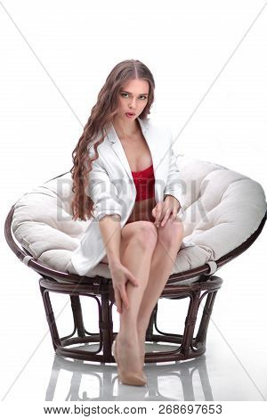 Close Up. Portrait Of Sexy Young Woman In Lingerie Sitting In Papasan Chair