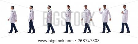 Young doctor physician standing walking isolated on white backgr