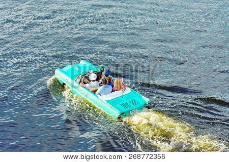 Orlando, Florida ; July 31, 2018 Water Taxi , Vintage Car, Funny People.