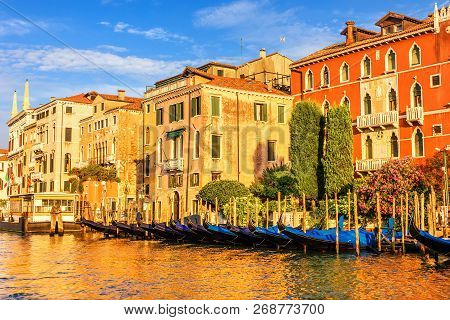 Gondolas Nearby Old Venice Palaces In The Canal Near Rialto Brid