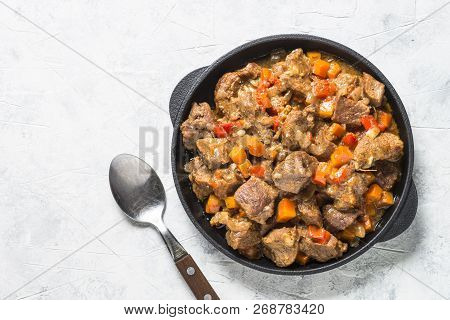 Beef Stew With Vegetables On Light Background. European Cuisine. Top View.