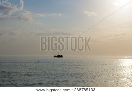 Small Passenger Boat Running In The Sea