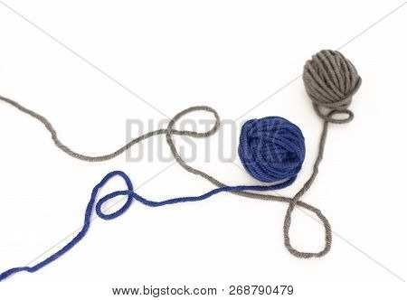 Balls Of Wool Close Up On White Background , Blue And Gray Wool Isolated