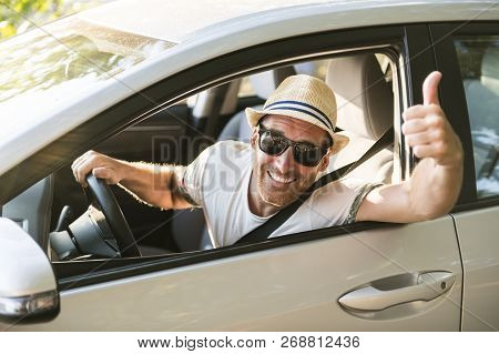 Men Sitting In A Rental Car On Holiday Vacancy