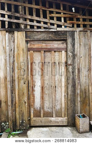 Rustic Wooden Entry Door In A Funky Wood House In Rural Southeast Asia