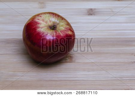 Red Apple On The Table