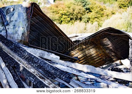 Damaged Industry Supermarket After Arson Fire With Burn Debris Of Twisted Metallic Wood Structure Af