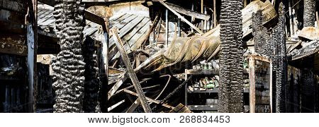 Damaged Industry Supermarket After Arson Fire With Burn Debris Of Twisted Metallic Wood Structure Af