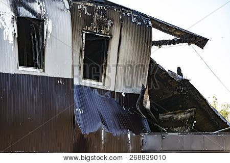 Damaged Industry Supermarket After Arson Fire With Burn Debris Of Twisted Metallic Wood Structure Af