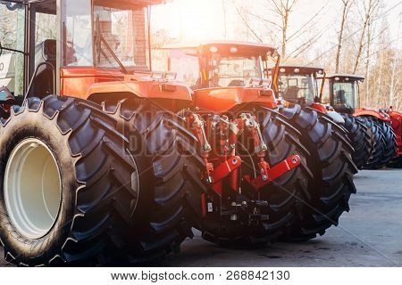Rear View Of Modern Agricultural Tractors With Hydraulic Lifting Frame For Attaching Trailed Equipme