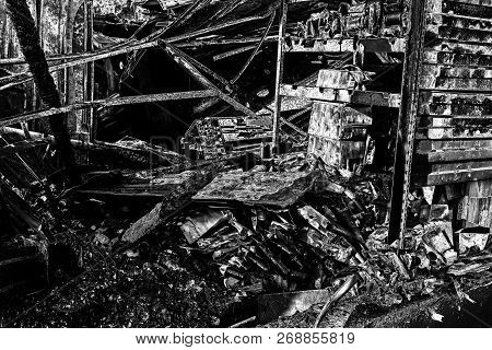 Damaged Industry Supermarket After Arson Fire With Burn Debris Of Twisted Metallic Wood Structure Af