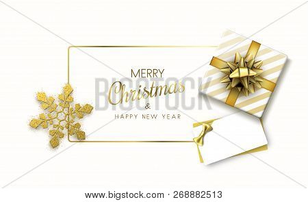 Merry Christmas And Happy New Year Card With Gift And Golden Sno