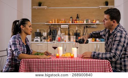 Sweet Couple Having A Romantic Dinner At Home
