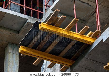 Close Up Wooden Beams At Modern Construction Site Of Building