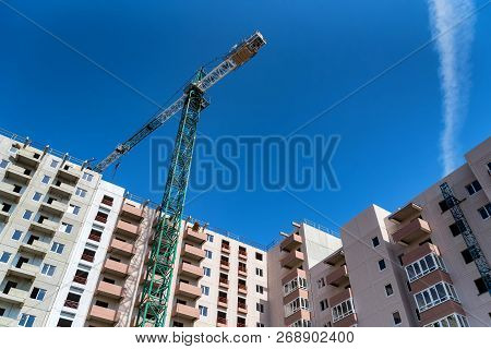 Modern Construction Site Of Building With Crane