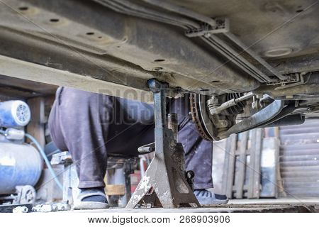 Forged Car For A Hundred. Car Repair. Car View From Below.