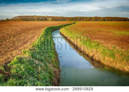Dutch Plowed Fields Intersected By A Meandering Ditch. The Colors Have Been Artificially Changed By 
